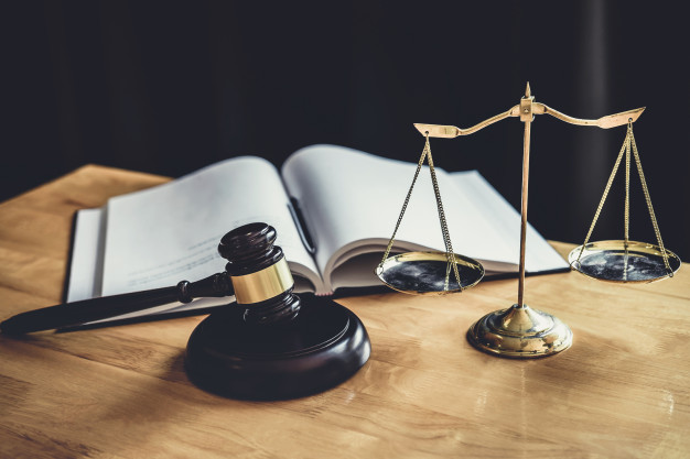 judge-gavel-with-scale-justice-object-documents-working-table-courtroom_28283-1217